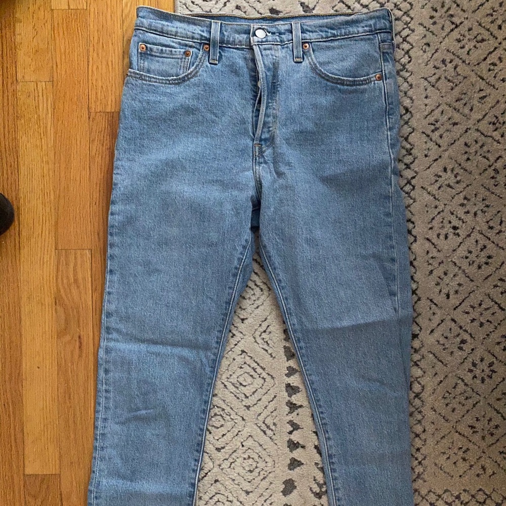 Levi’s light wash jeans. Skinny cut, raw hem